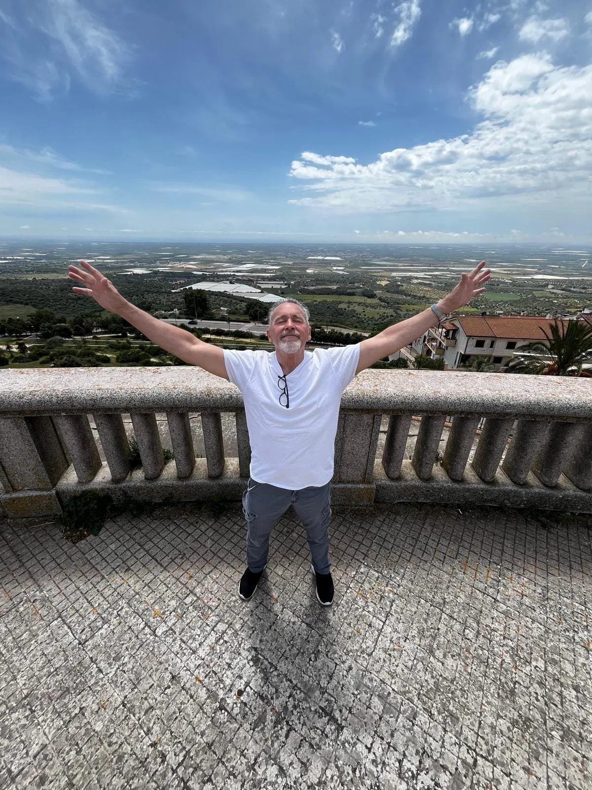 Mike enjoying the view in Mottola during his tour in Italy with Margherita.