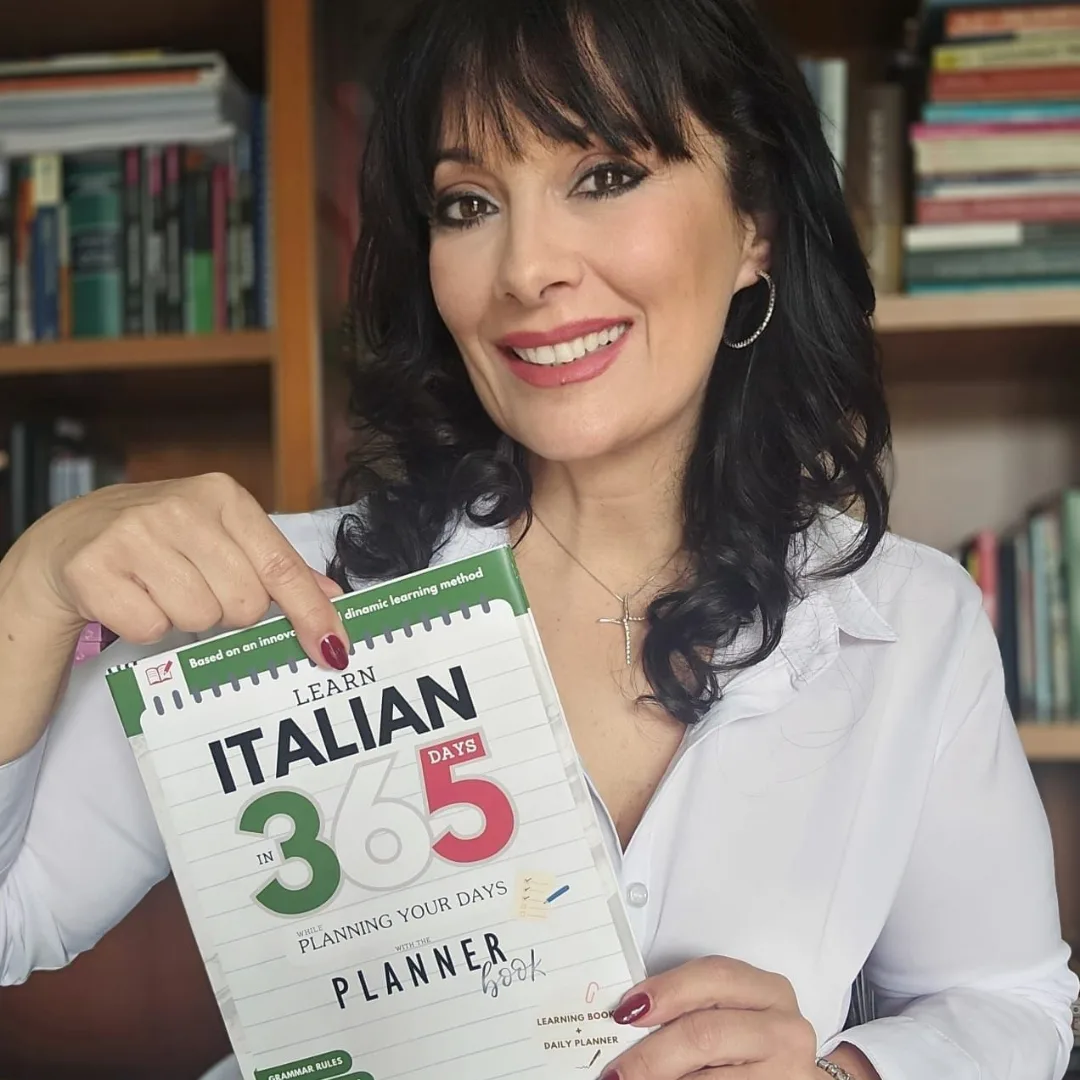 Margherita showing her bestseller "The PlannerBook"
